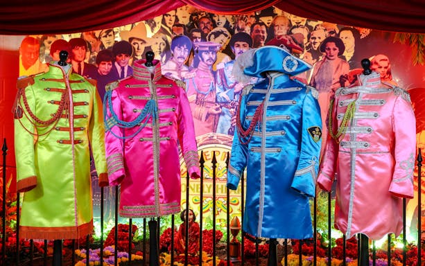 Sgt. Pepper's Lonely Hearts Club Band uniforms at The Beatles Story exhibit.