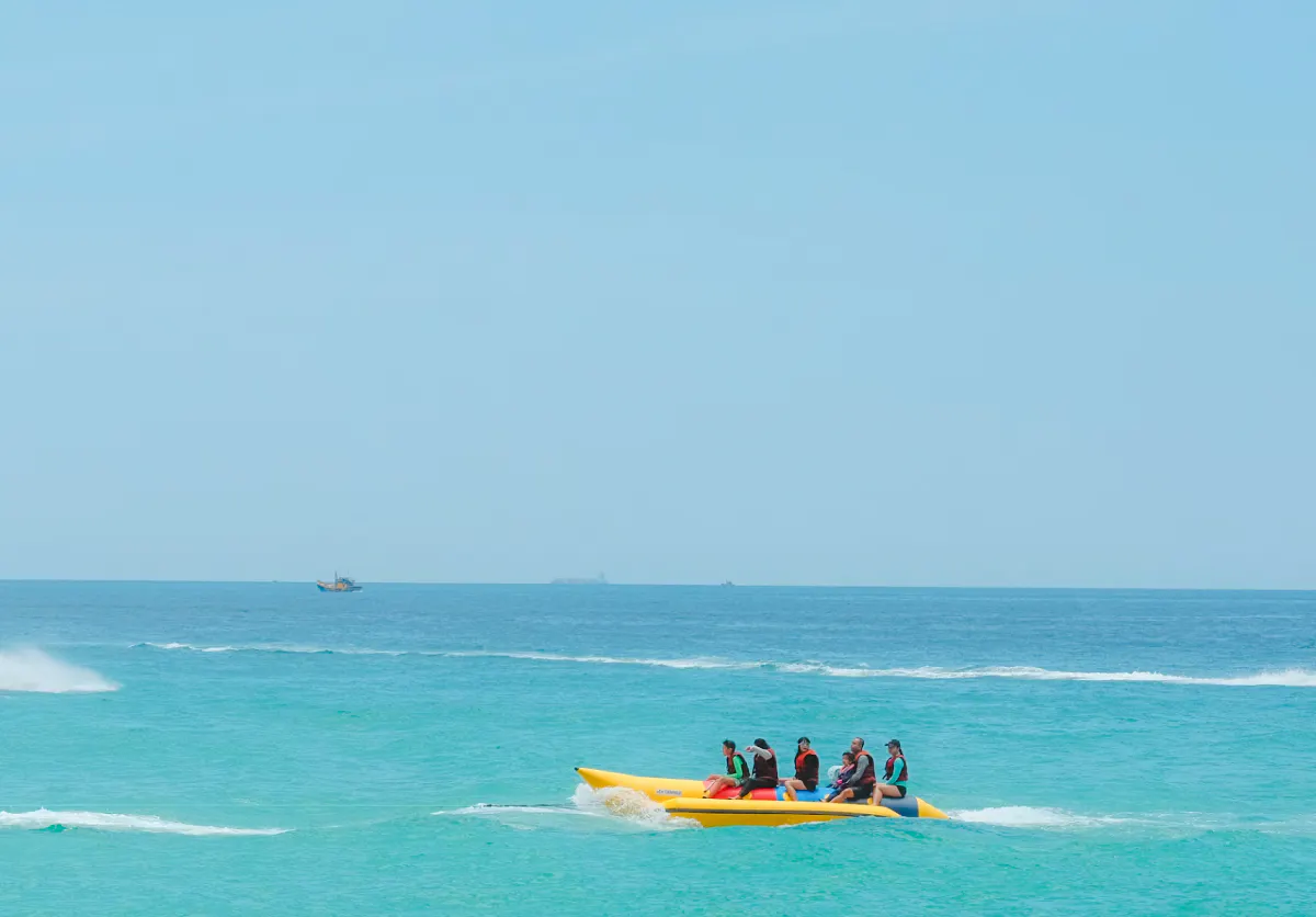 Group enjoying banana boat ride on Pattaya to Coral Island tour.