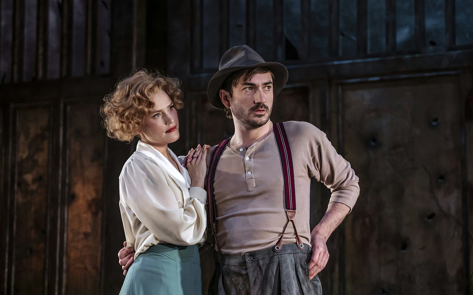 Actors portraying Bonnie and Clyde in a theatrical performance.