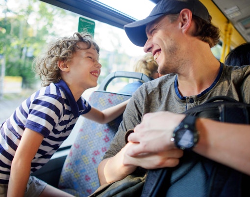 Berlin hop-on hop-off bus tour passing Brandenburg Gate.