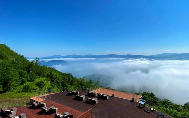 Mt. Usu viewing deck with scenic mountain and cloud views, Japan.