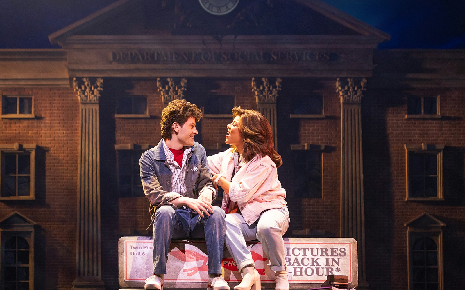 Actors performing a scene from Back to the Future the Musical on stage.