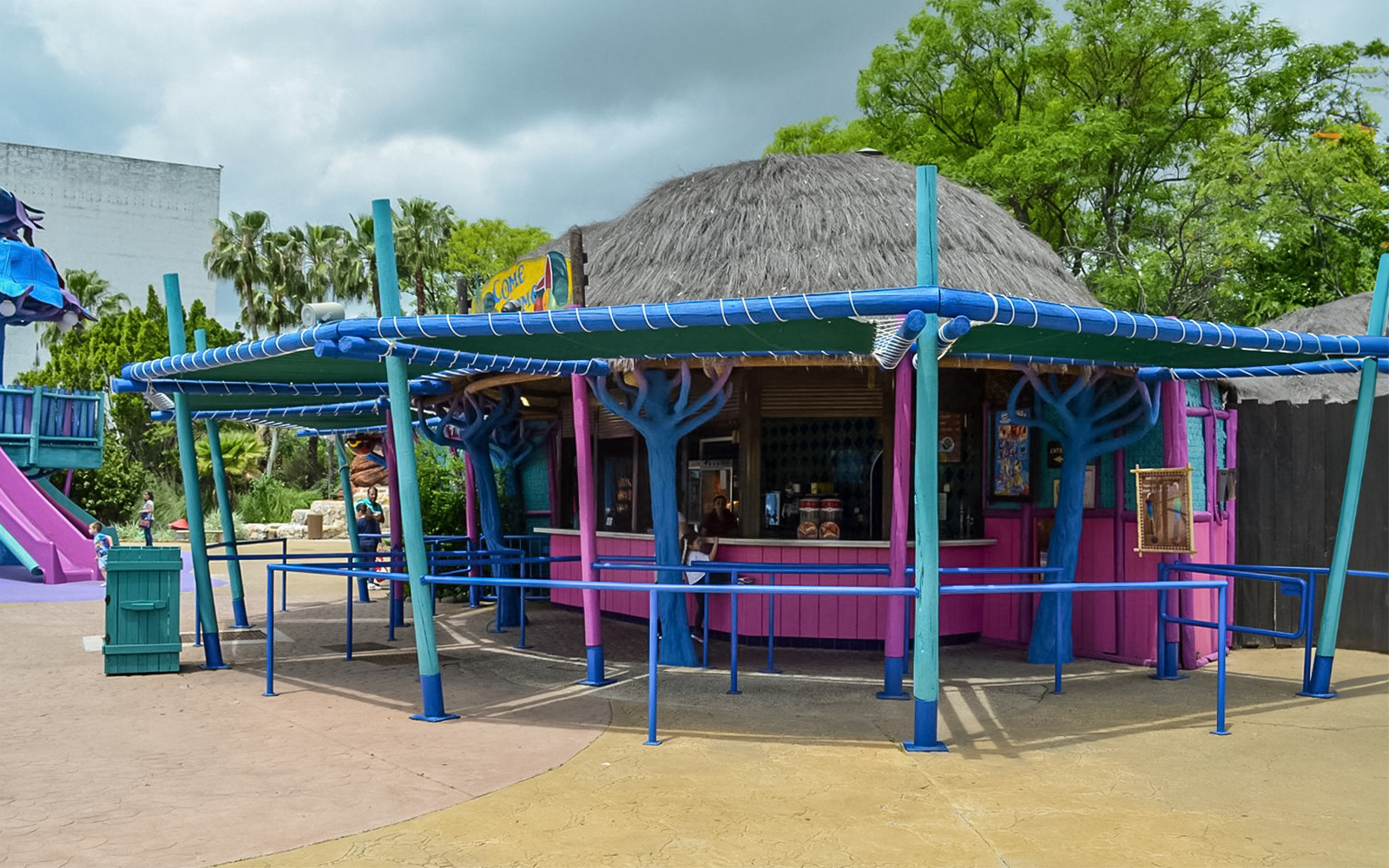 People dining at Come Come Restaurant in Isla Mágica theme park, Seville, Spain.