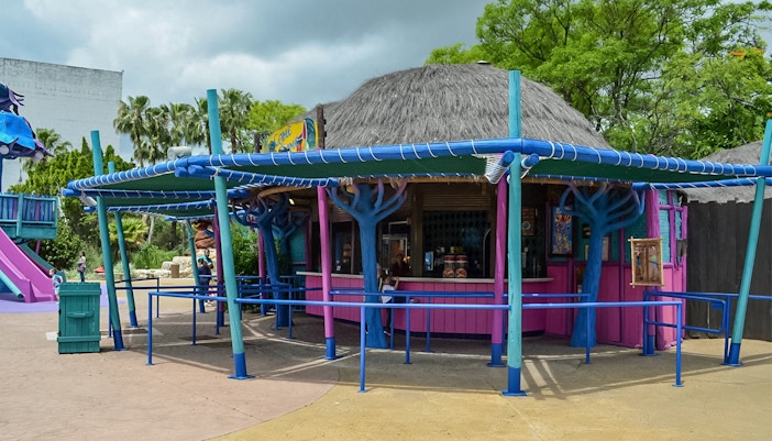 People dining at Come Come Restaurant in Isla Mágica theme park, Seville, Spain.