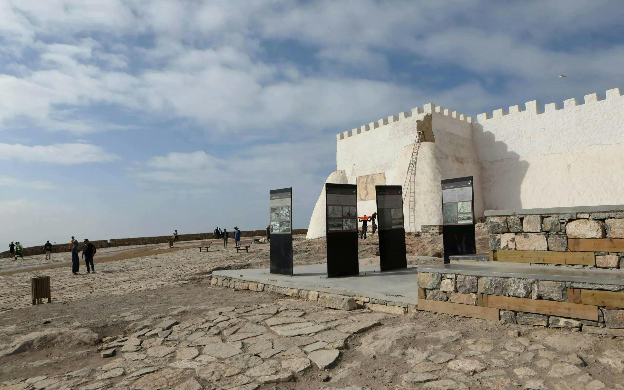 Kasbah of Agadir Oufella with tourists exploring historical site in Agadir, Morocco.