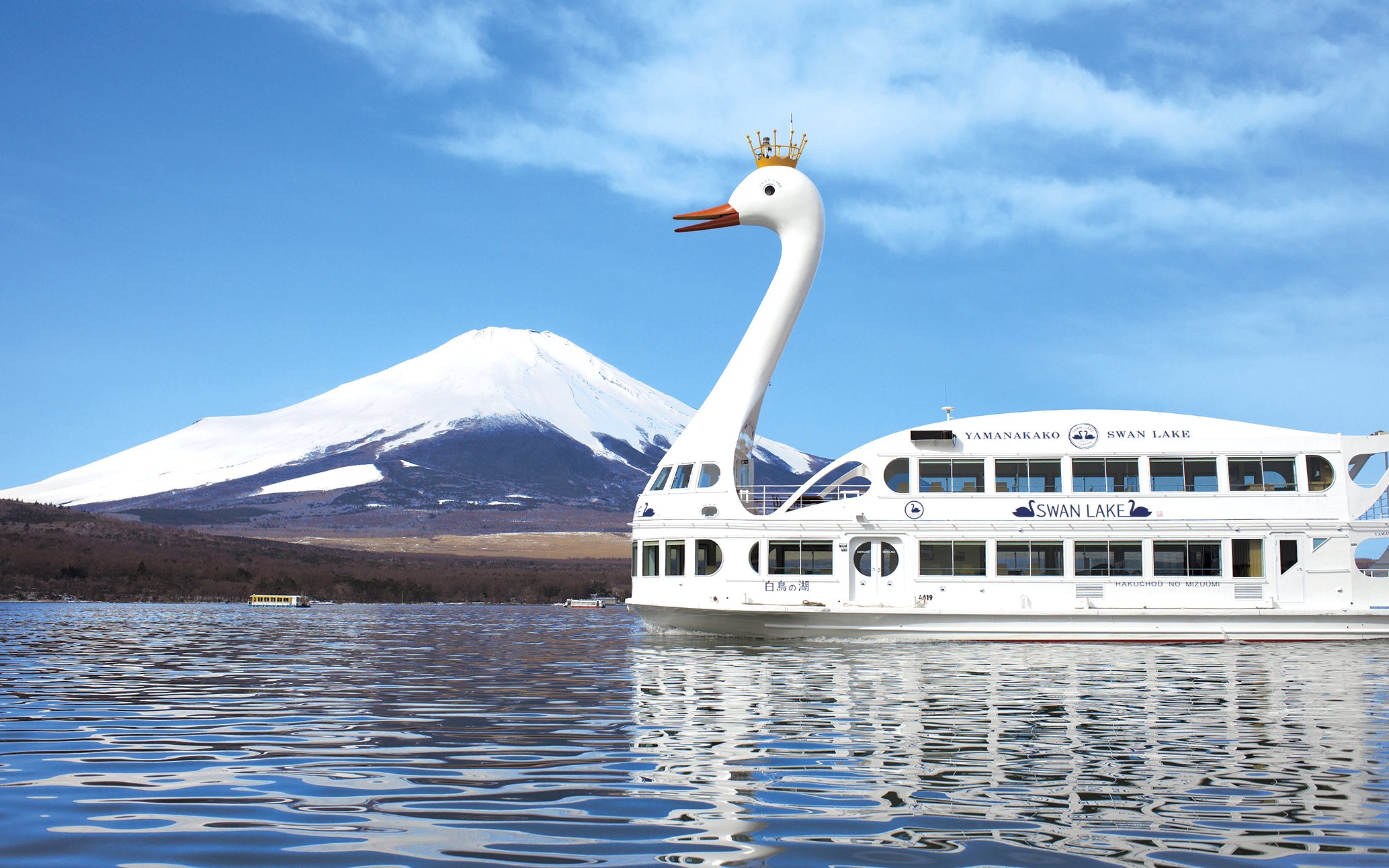 Yamanakako Swan Lake sightseeing boat with Mount Fuji in the background.