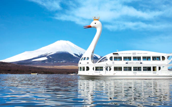 Yamanakako Swan Lake sightseeing boat with Mount Fuji in the background.