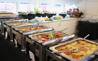 Luxury buffet spread on a catamaran cruise in Sydney.