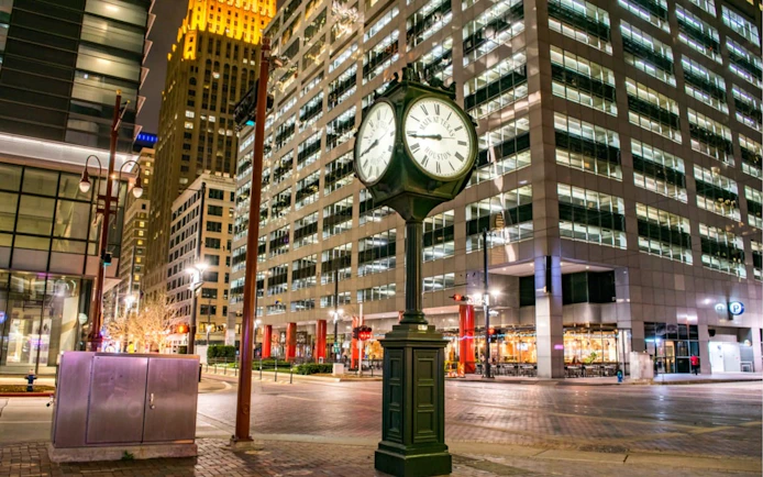 Clock tower in downtown Houston at night, part of the Haunted Houston city exploration game.