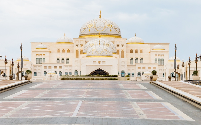 Qasr Al Watan palace in Abu Dhabi with ornate domes and grand entrance.