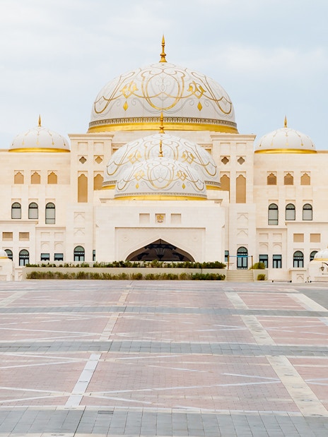 Qasr Al Watan palace in Abu Dhabi with ornate domes and grand entrance.