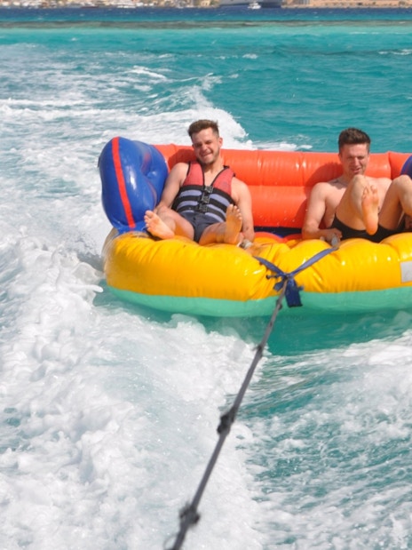 Sofa ride on turquoise waters at Orange Bay, Hurghada.