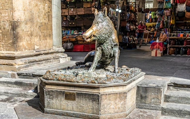Bronze boar statue at Mercato Nuovo in Florence, Italy, part of Florence & Pisa from Milan tour.
