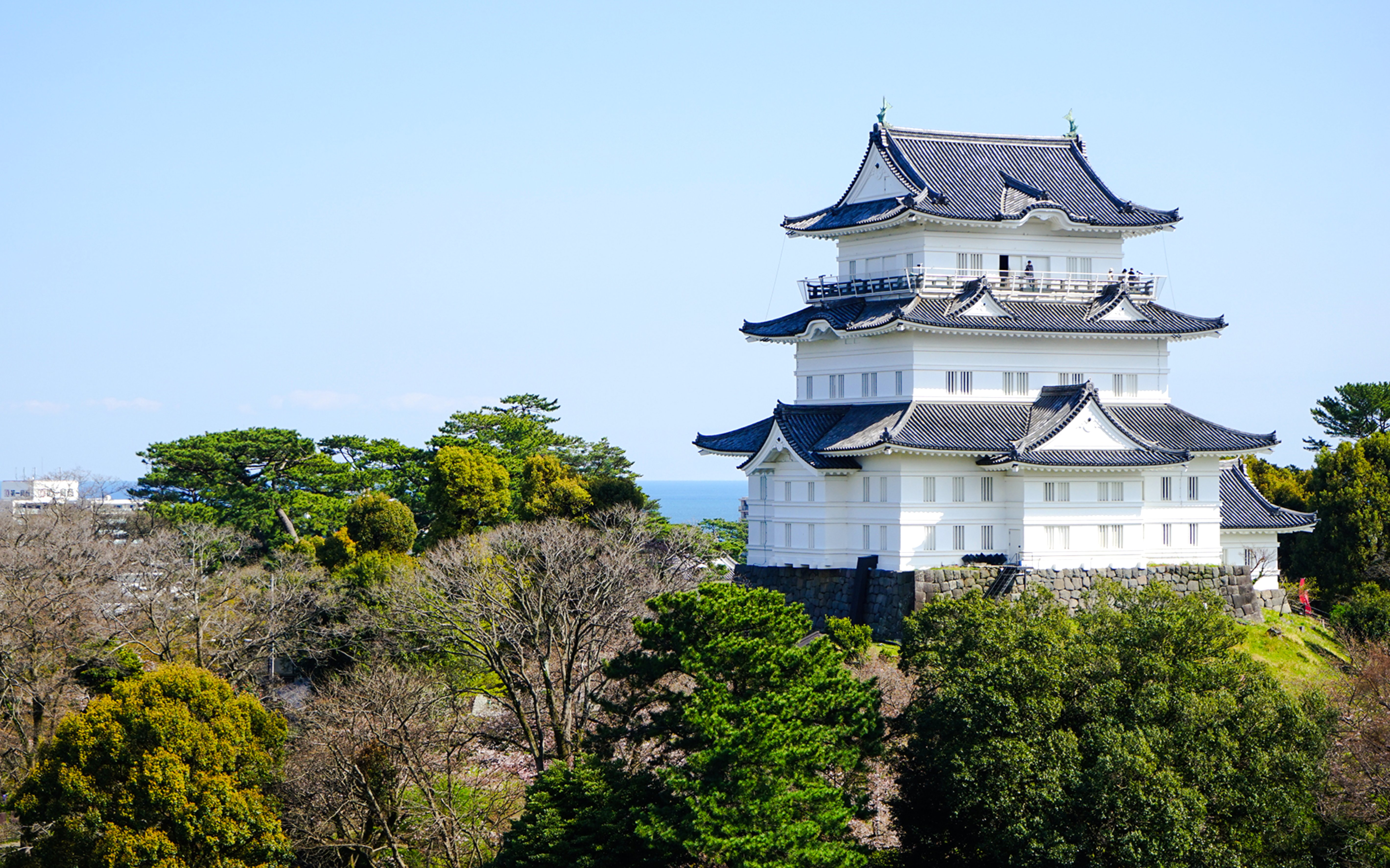 Odawara Castle surrounded by trees in Kanagawa, Japan.