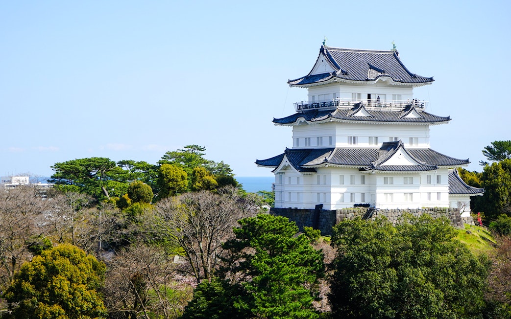 Odawara Castle surrounded by trees in Kanagawa, Japan.