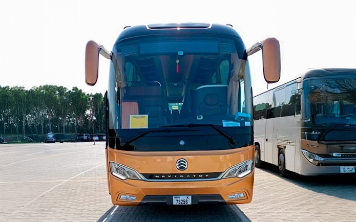 Tour bus parked at Aquaventure Waterpark, Dubai.