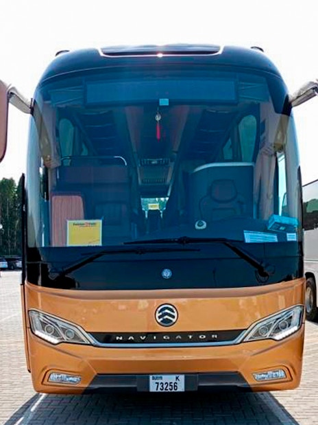 Tour bus parked at Aquaventure Waterpark, Dubai.