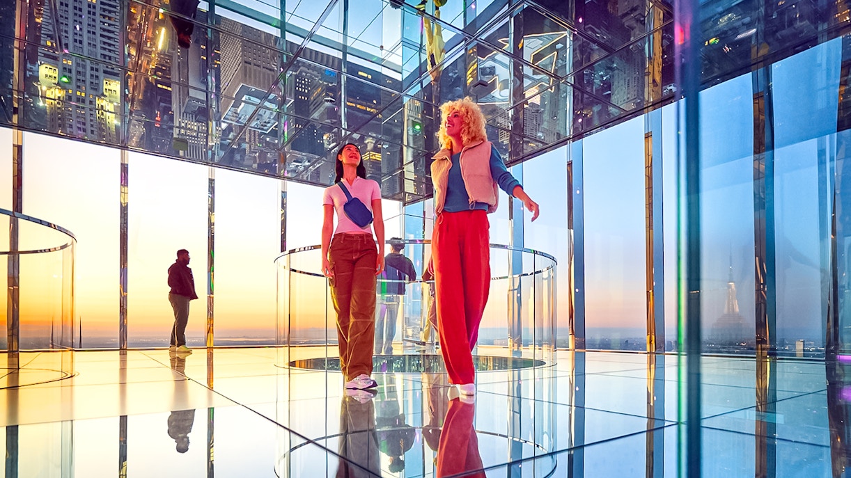 Visitors enjoying the mirrored observation deck at SUMMIT One Vanderbilt, New York City.