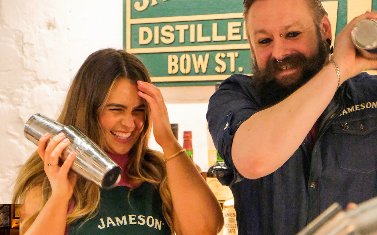 Participants enjoying cocktail-making at Jameson Distillery, Bow St.