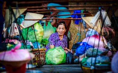 Street vendor with produce on Saigon food tour, Ho Chi Minh City.