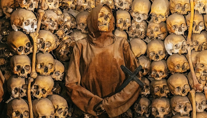 Group of tourists on a Guided Tour of Roman Basilicas & Underground Catacombs on the Appian Way in Rome, Italy