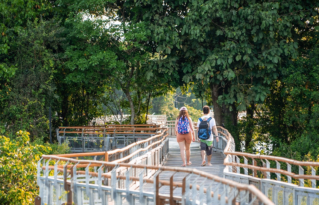 Tourists waling on trails to iguazu falls