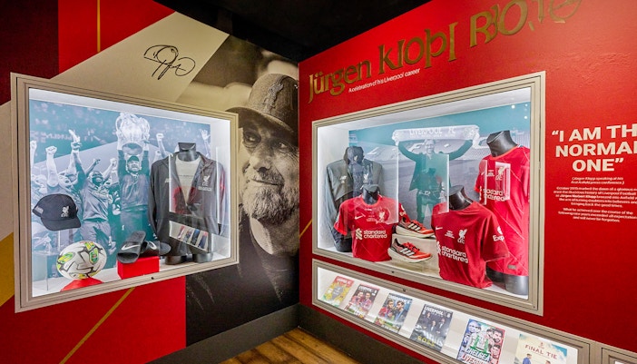 Visitors exploring the Liverpool FC Stadium during the tour, with Museum Entrance Tickets in Liverpool, England