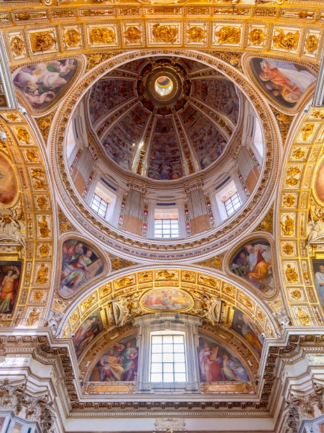 Intricate interior details of Santa Maria Maggiore basilica dome in Rome.