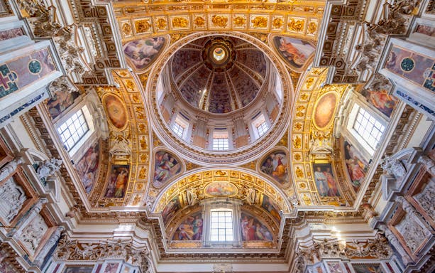 Intricate interior details of Santa Maria Maggiore basilica dome in Rome.