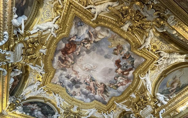 Pitti Palace ceiling frescoes depicting mythological figures in Florence, Italy.