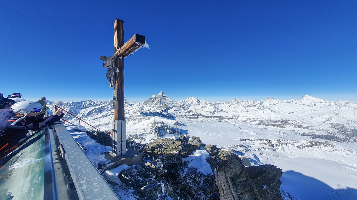 Viewing platform at Matterhorn Glacier Paradise with snowy mountain panorama.