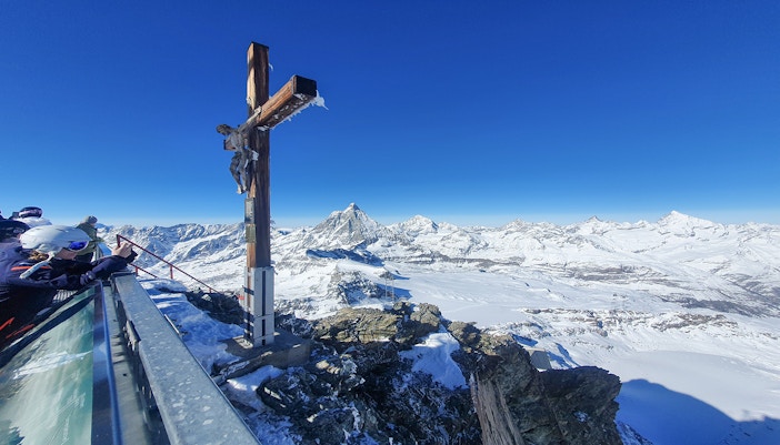 Viewing platform at Matterhorn Glacier Paradise with snowy mountain panorama.