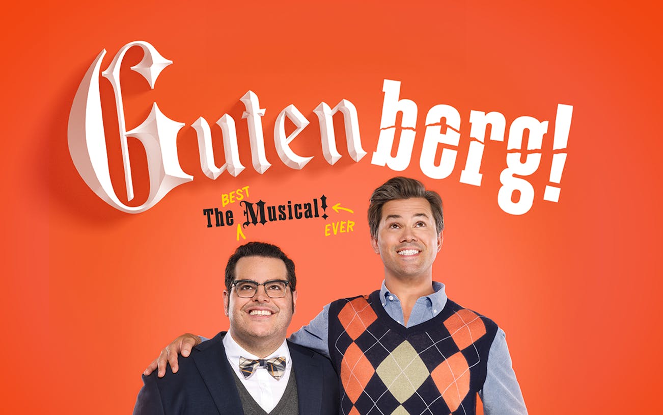 Gutenberg! The Musical! promotional image with two smiling men against an orange background.