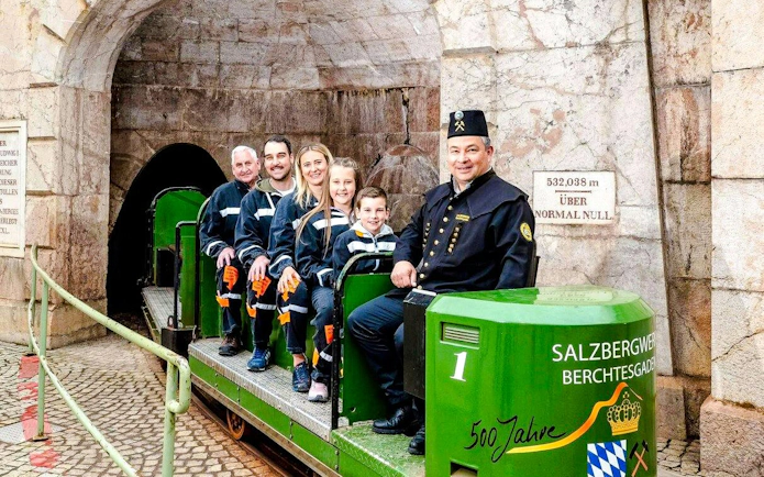 Guests on mine train ride at Berchtesgaden Salt Mine entrance.