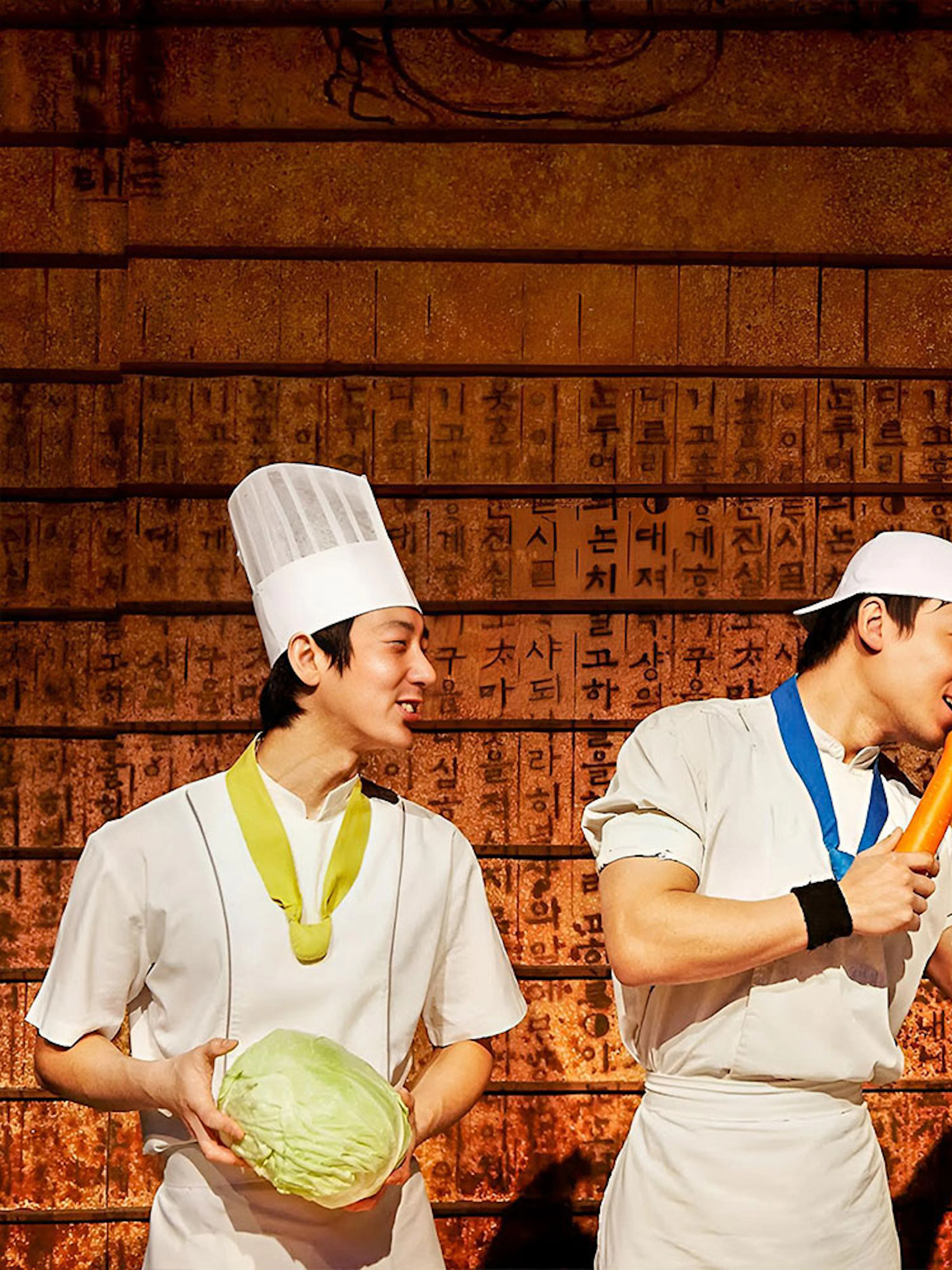 Chefs performing with vegetables at Jeju Nanta Musical Show.