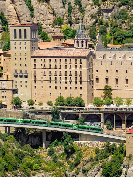 Train arriving at Montserrat Monastery, nestled in the mountains near Barcelona.