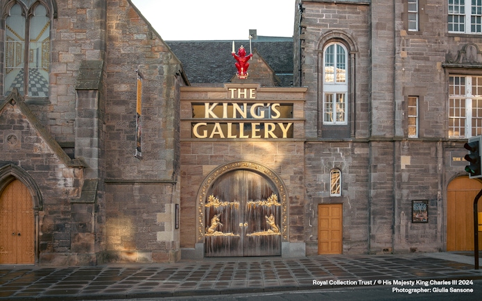 King's Gallery entrance with ornate wooden doors and stone facade in Edinburgh.