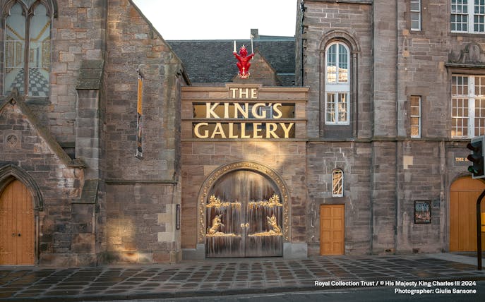 King's Gallery entrance with ornate wooden doors and stone facade in Edinburgh.