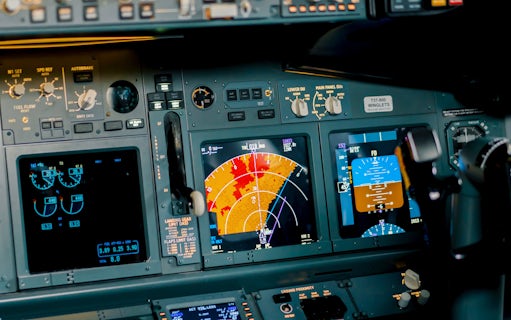 Radar control and navigation panel in Boeing 737 Flight Simulator cockpit.