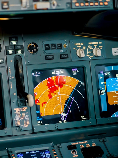 Radar control and navigation panel in Boeing 737 Flight Simulator cockpit.