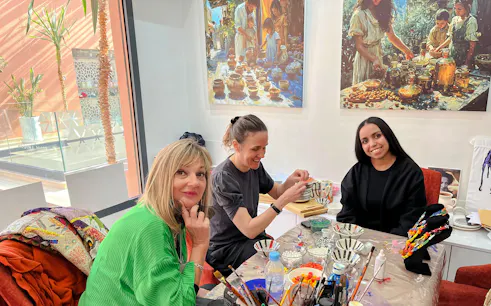 Art workshop participants crafting in the Medina, Marrakesh.