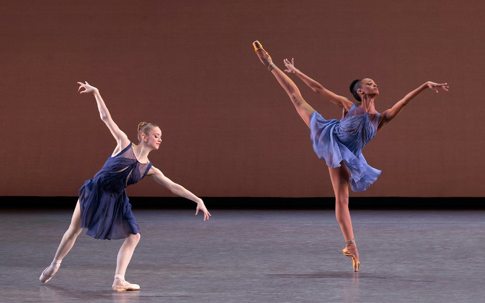 Ballet dancers performing on stage at New York City Ballet.