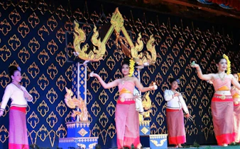 Traditional Thai dancers performing at Nopparat Thai Set Dinner, Bangkok.