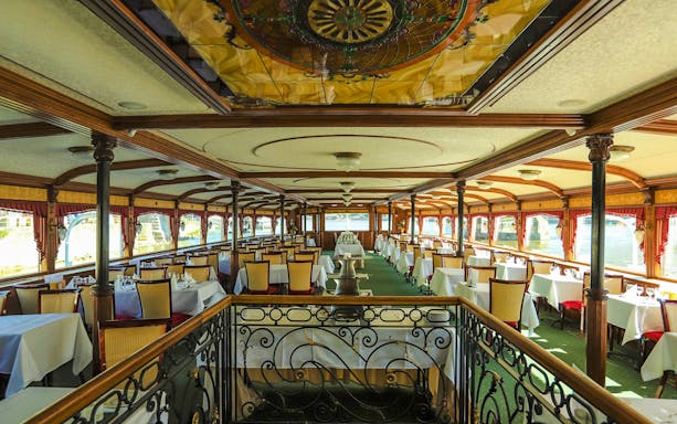 Elegant dining area on the Inside Sunshine Booze Cruise, Budapest.