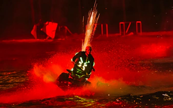 Jet ski performance with fireworks at night, Phu Quoc's Symphony of the Sea event.