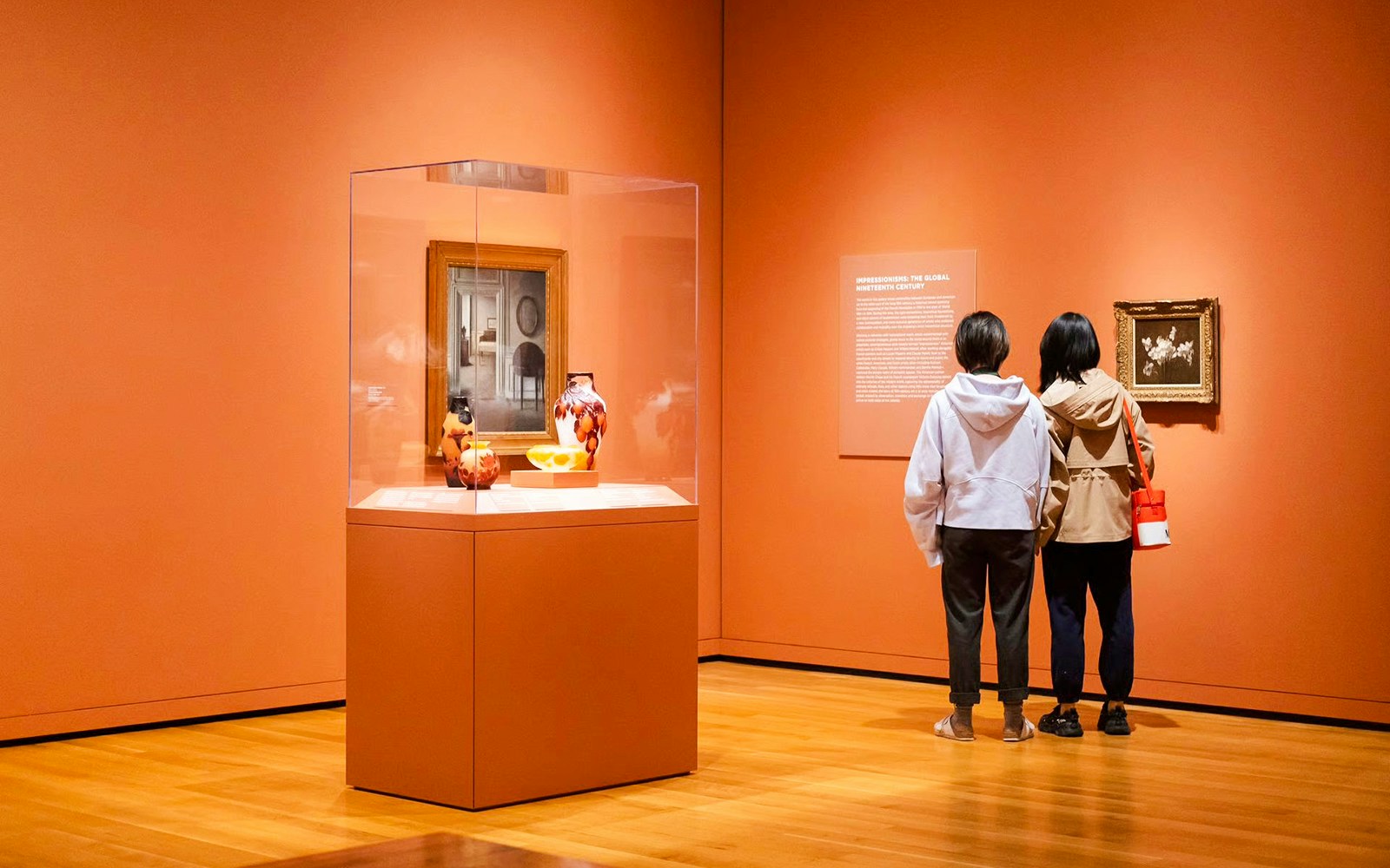 Visitors viewing art exhibits at Seattle Art Museum.