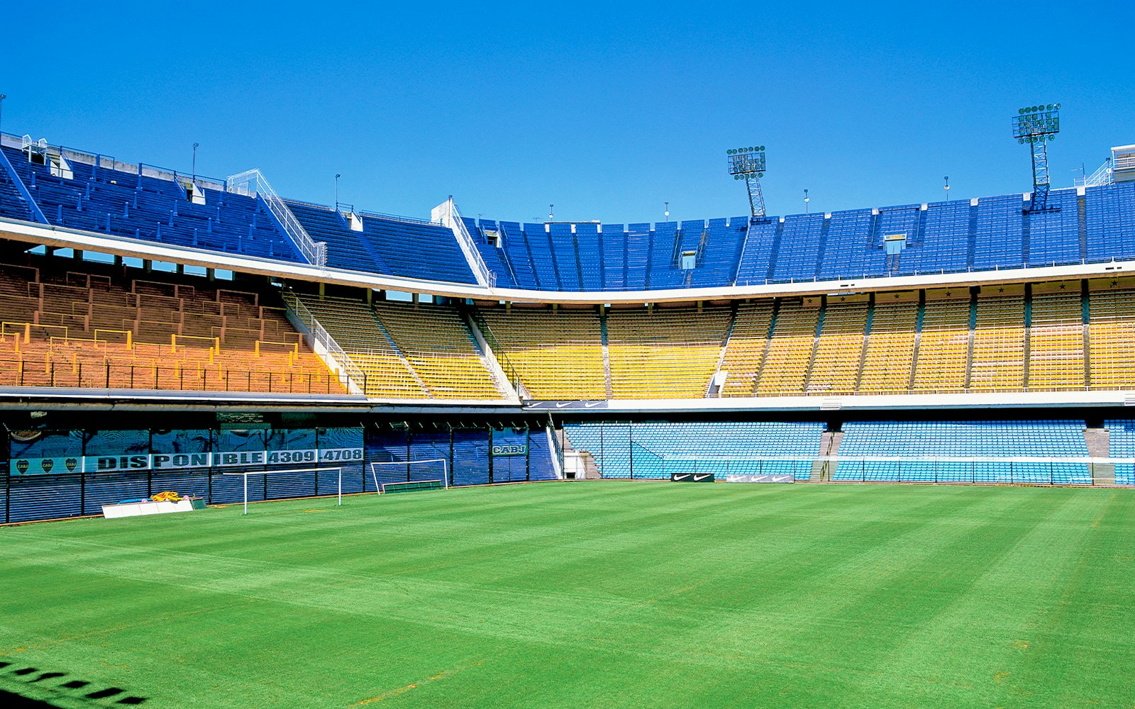Boca Juniors Stadium exterior with colorful murals in Buenos Aires, Argentina.