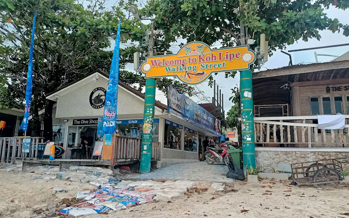 Koh Lipe Walking Street entrance near dive shop, Thailand.