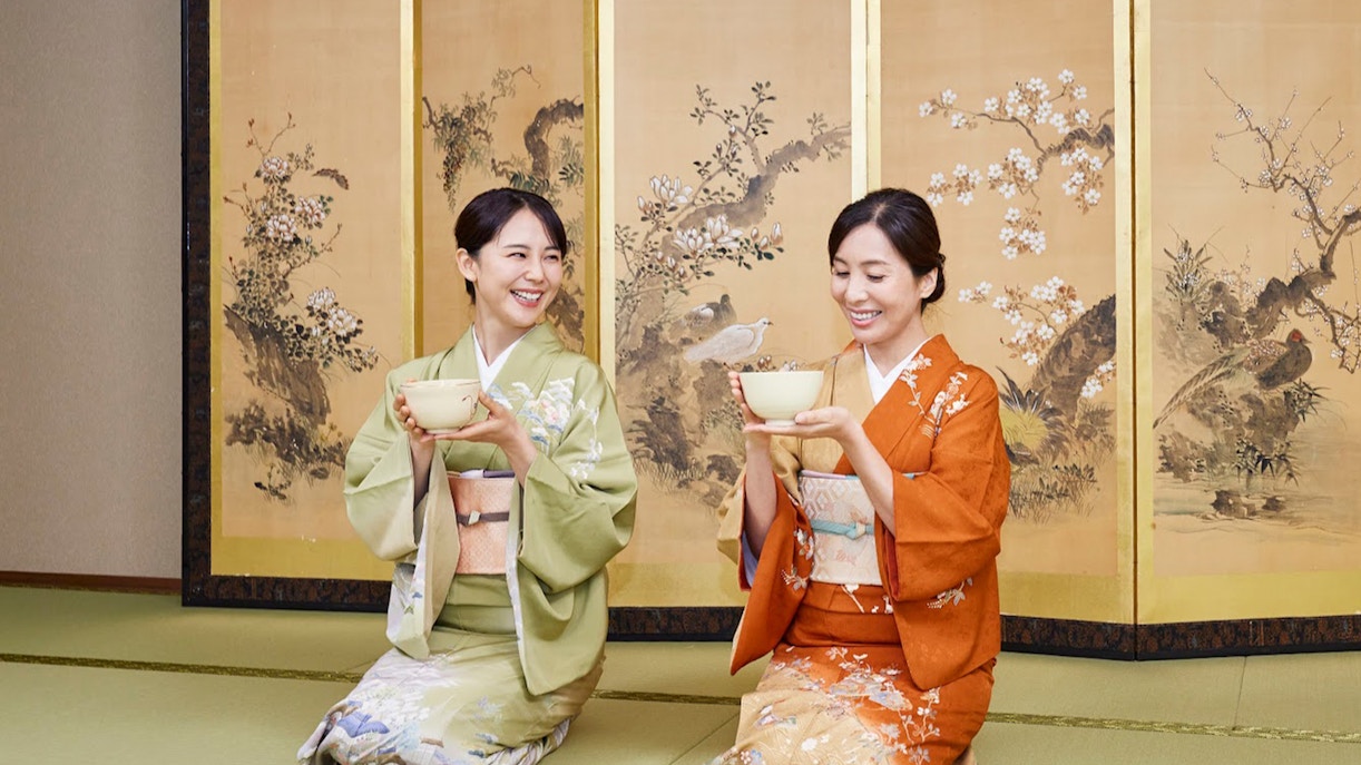Tourists participating in a Tokyo Maikoya Traditional Tea Ceremony wearing colorful kimonos in Japan