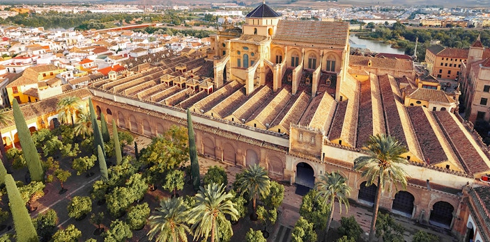 Aerial view of the Cordoba Mosque-Cathedral with surrounding gardens in Spain.